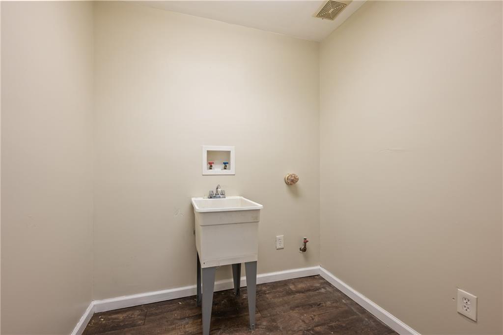 912 2nd Street McKees Rocks, PA 15136 - Photo 11 of 24 a room with a bench