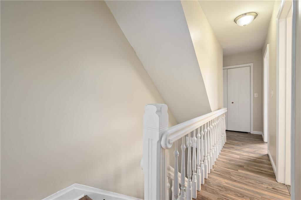 912 2nd Street McKees Rocks, PA 15136 - Photo 13 of 24 a view of a hallway with wooden floor and entryway
