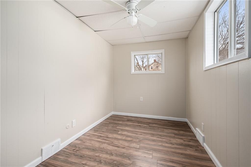 912 2nd Street McKees Rocks, PA 15136 - Photo 16 of 24 wooden floor in an empty room with a window