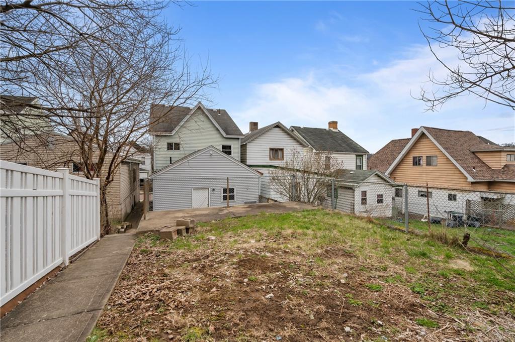 912 2nd Street McKees Rocks, PA 15136 - Photo 24 of 24 front view of a house with a yard