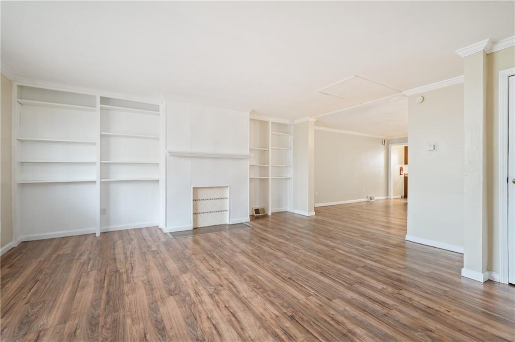 912 2nd Street McKees Rocks, PA 15136 - Photo 6 of 24 a view of empty room with wooden floor