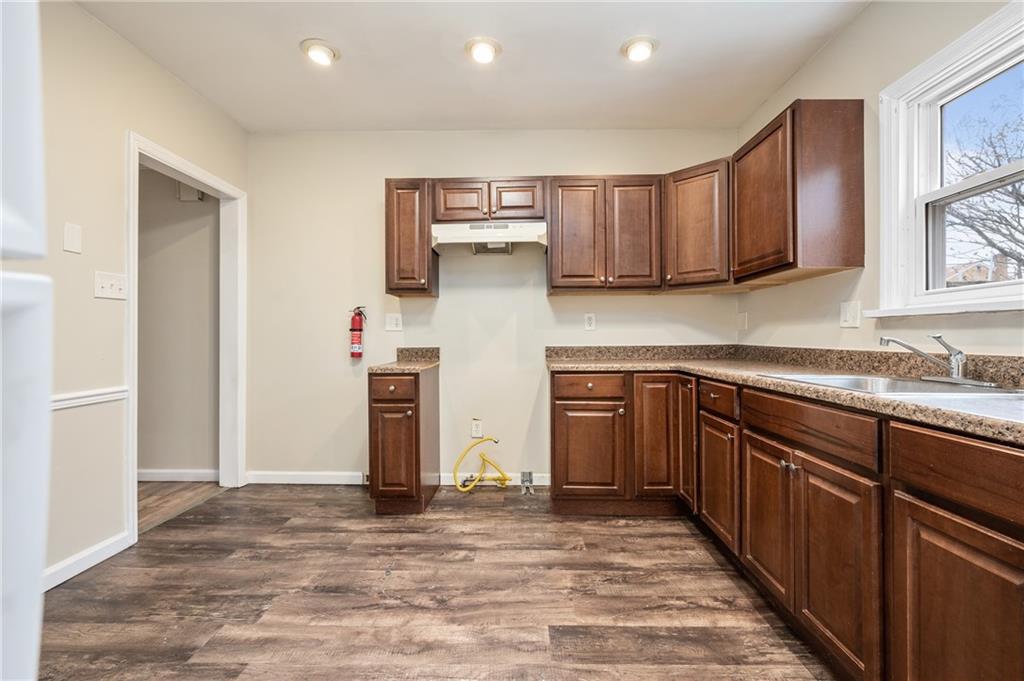 912 2nd Street McKees Rocks, PA 15136 - Photo 9 of 24 a kitchen with a sink and cabinets