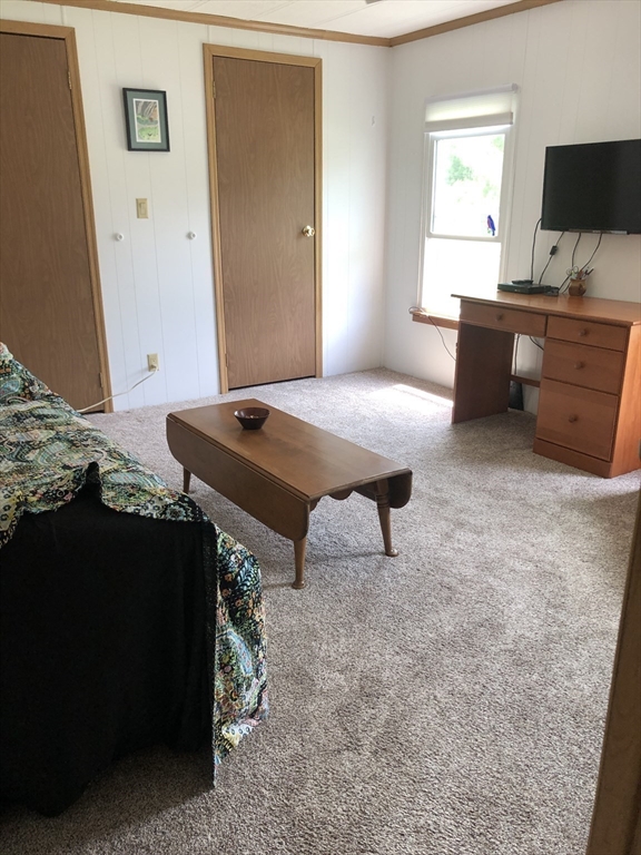 41 Pipers Way Carver, MA 02330 - Photo 22 of 36 a workspace with furniture and window
