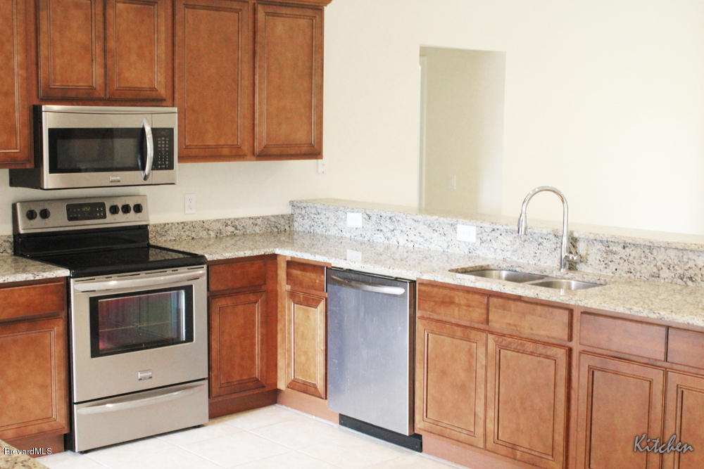 517 Lambright Street Southwest Palm Bay, FL 32908 - Photo 4 of 11 L-Kitchen-2