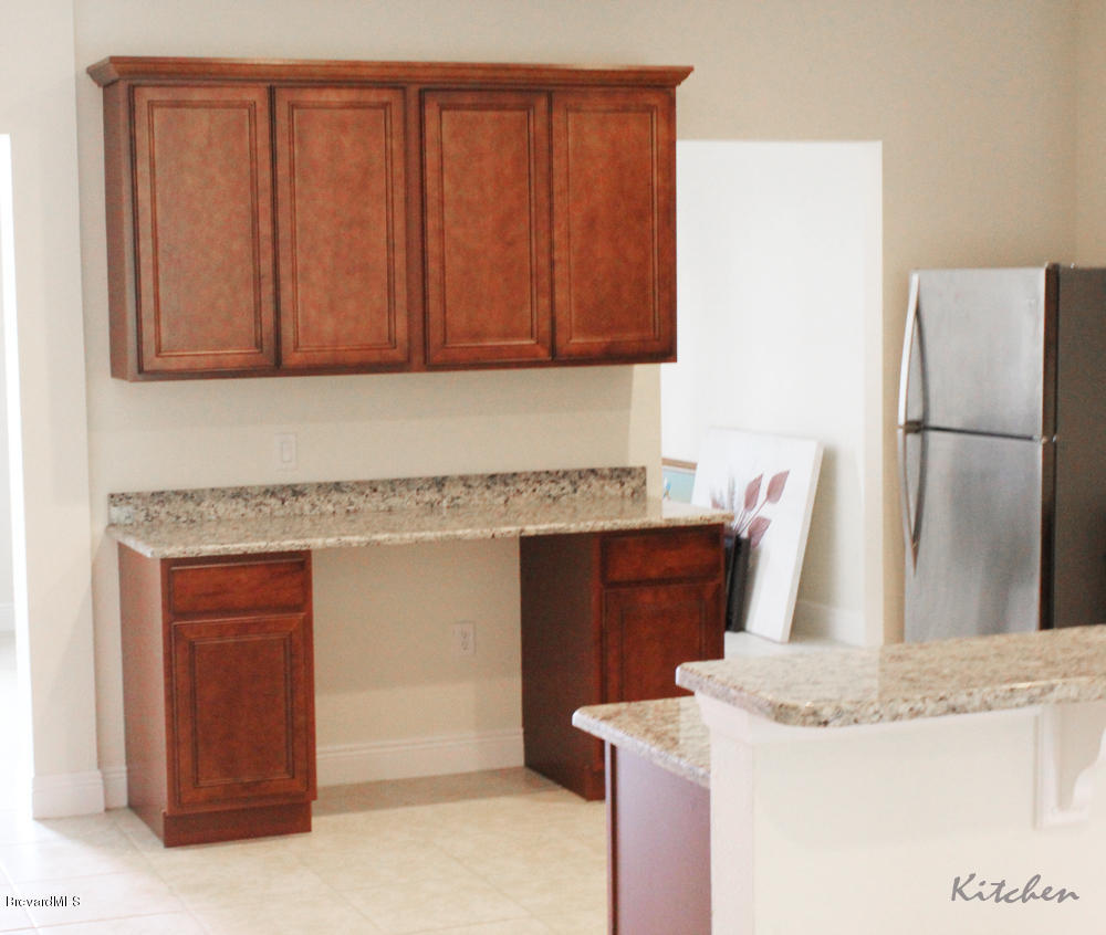 517 Lambright Street Southwest Palm Bay, FL 32908 - Photo 5 of 11 L-Kitchen-3