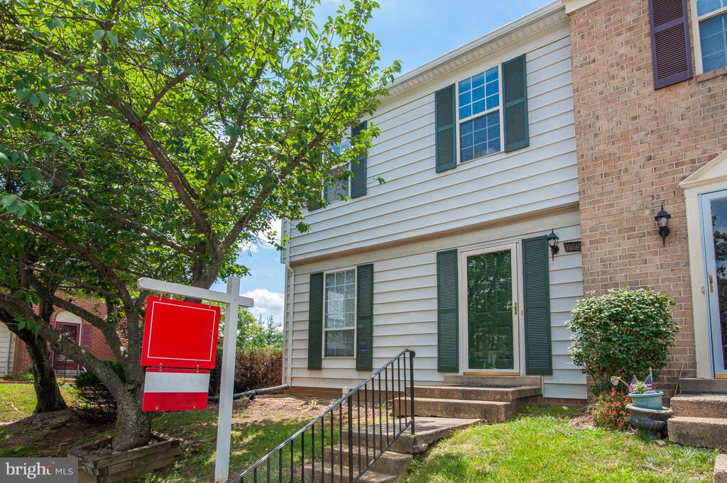 6601 China Grove Court Alexandria, VA 22310 - Photo 1 of 28 a front view of a house with garden