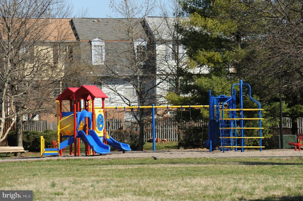 6601 China Grove Court Alexandria, VA 22310 - Photo 27 of 28 a view of tennis ground with large trees