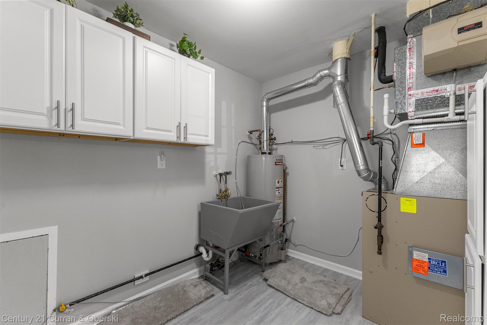7120 Jackson Street Taylor, MI 48180 - Photo 19 of 24 Utilities with heating unit and gas water heater