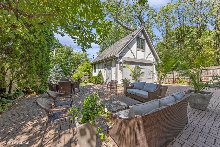 346 Ridge Avenue Clarendon Hills, IL 60514 - Photo 4 of 6 a view of house with patio outdoor seating and trees