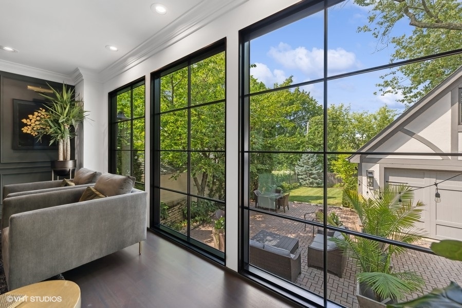 346 Ridge Avenue Clarendon Hills, IL 60514 - Photo 5 of 6 a living room with glass windows and furniture