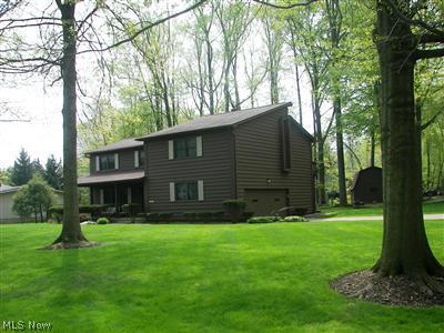 4546 Ridgewood Road Akron, OH 44321 - Photo 1 of 1 Excellent curb appeal and setting for this spacious two story colonial!