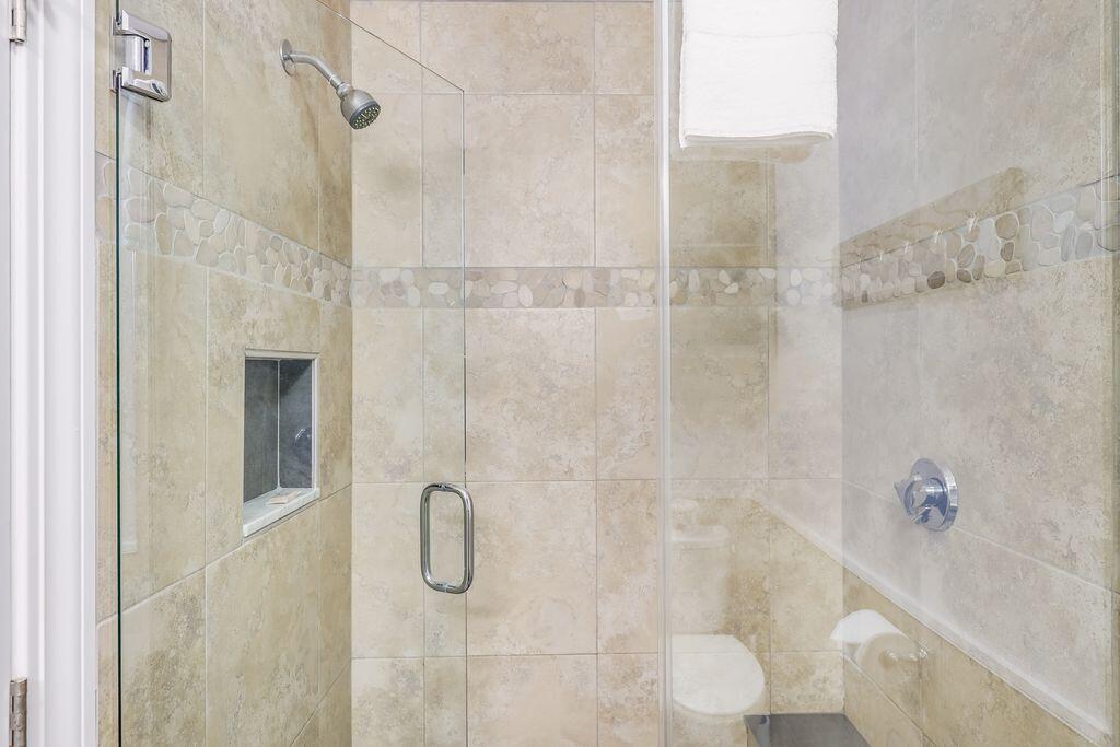 261 Linnell Landing Road, Unit 1 Brewster, MA 02631 - Photo 17 of 23 a bathroom with a shower