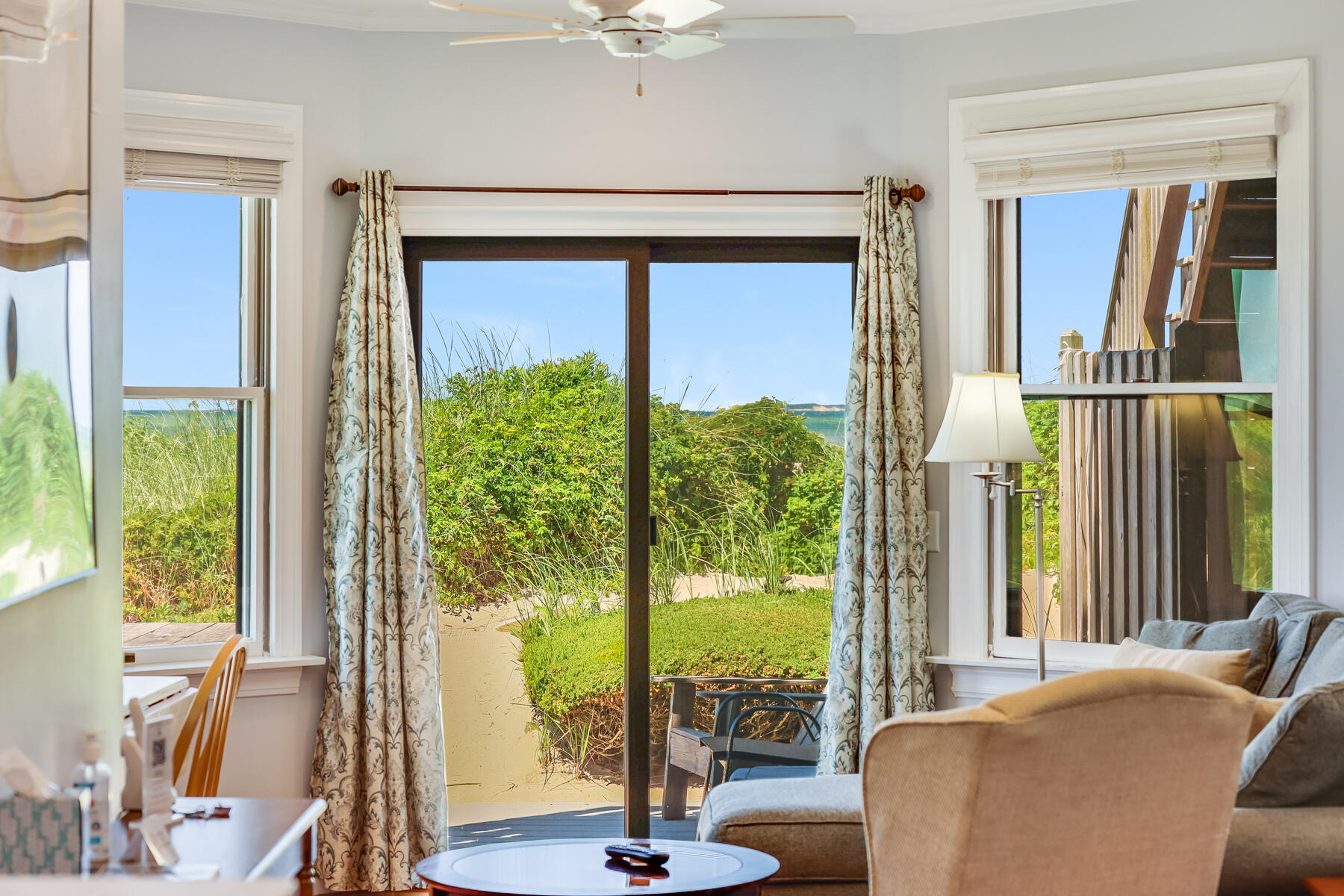 261 Linnell Landing Road, Unit 1 Brewster, MA 02631 - Photo 10 of 23 a view of a bedroom with a large window
