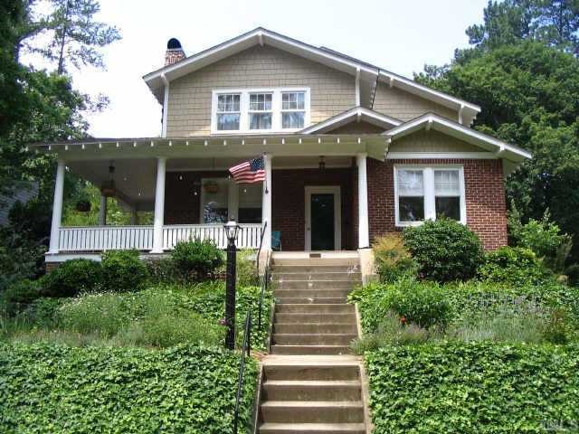 1601 Pineview Street Raleigh, NC 27608 - Photo 1 of 1 a front view of a house with a yard