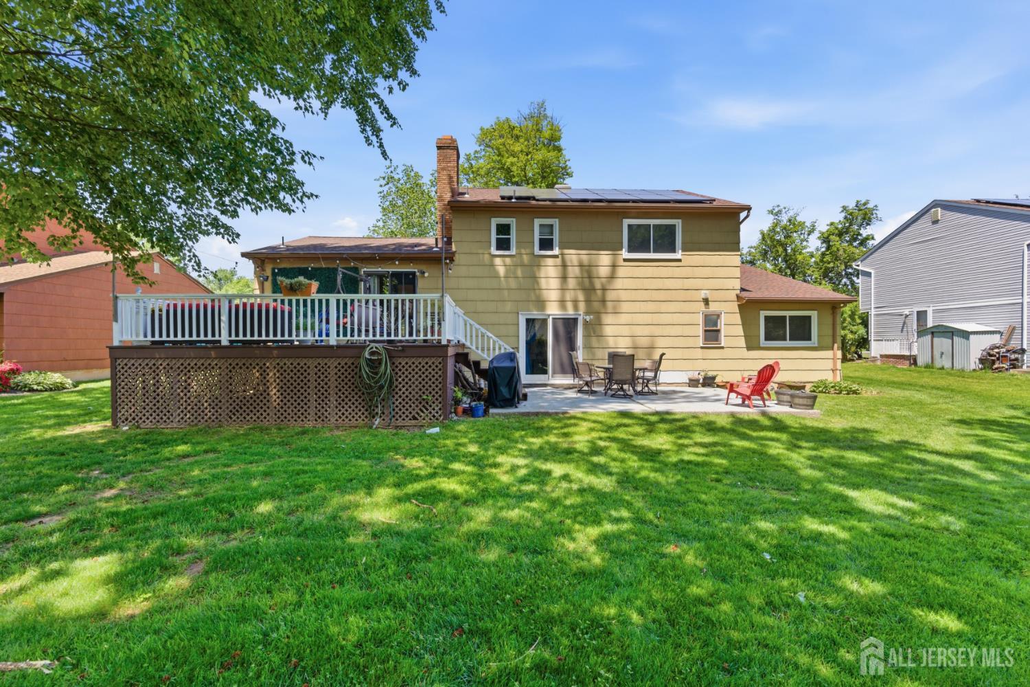 213 Normandy Road Edison, NJ 08820 - Photo 40 of 45 front view of a house with a yard