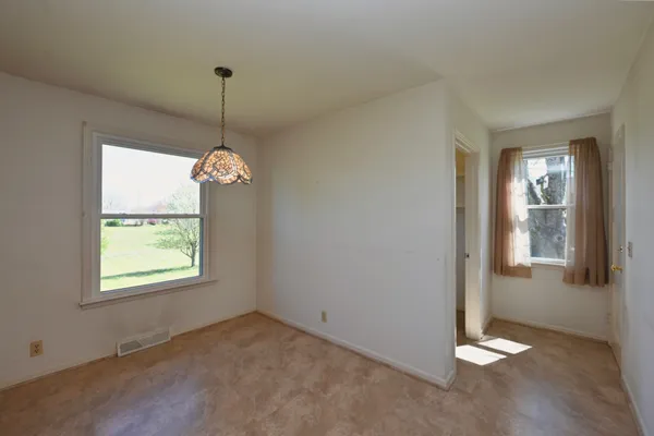an empty room with a window
