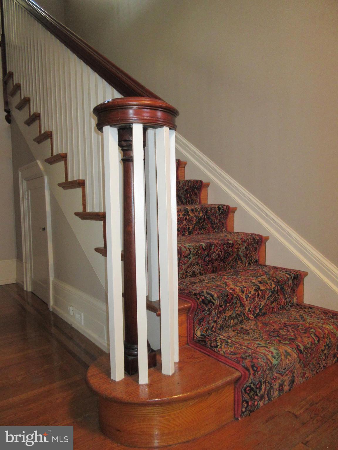 1100 Newlin Road York, PA 17403 - Photo 11 of 25 Wood staircase with turned banister.