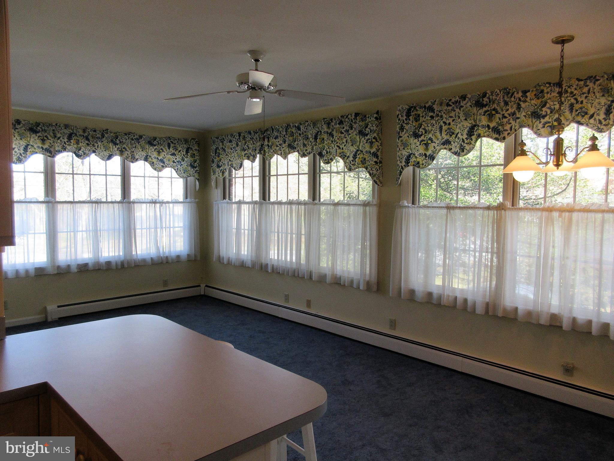 1100 Newlin Road York, PA 17403 - Photo 6 of 25 The family room is filled with sunny windows that
