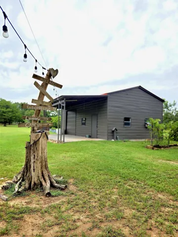 a view of a lake in middle of the house