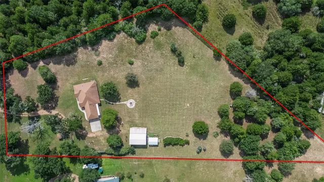 an aerial view of a city with lots of residential buildings