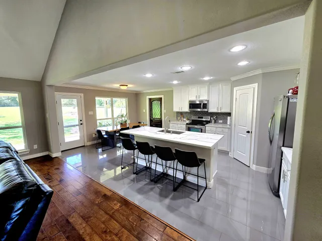 a large white room with a large window