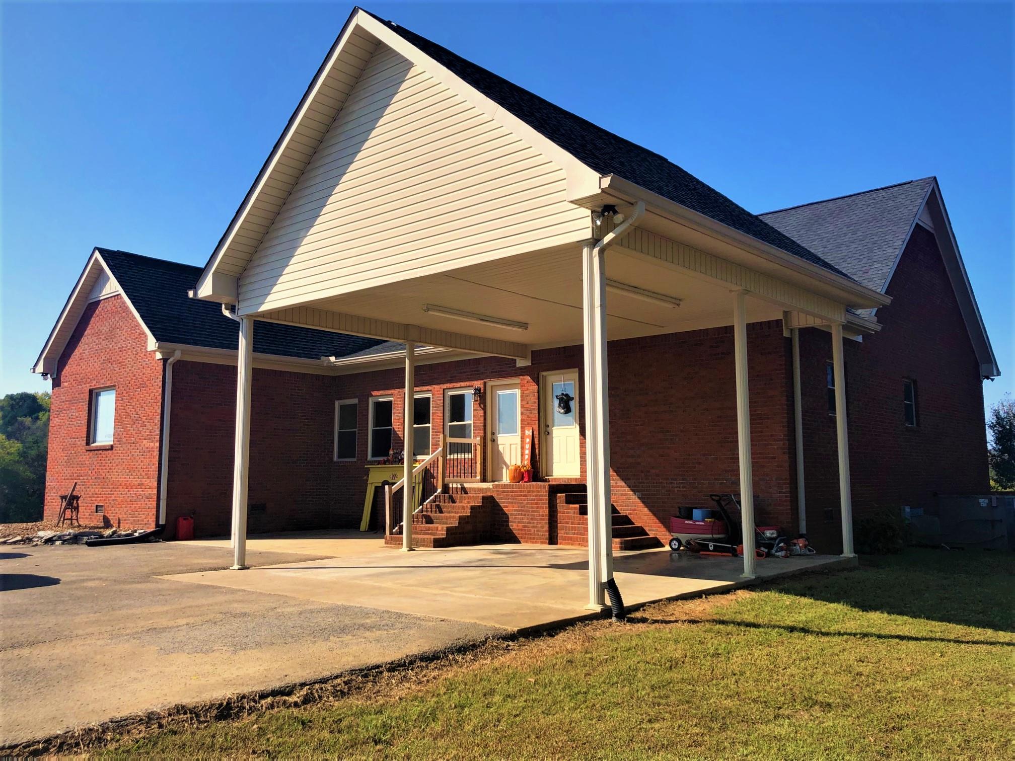 247 Poorhouse Road Taft, TN 38488 - Photo 3 of 32 a view of a house