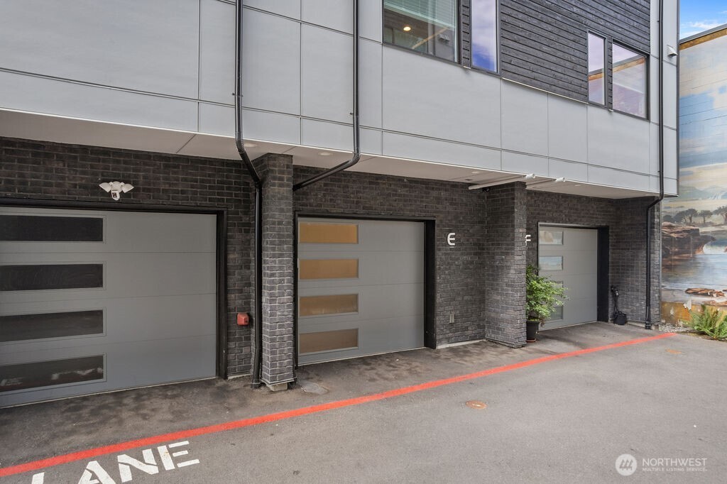 17338 Bothell Way Northeast, Unit E Bothell, WA 98011 - Photo 24 of 26 a view of a house with door