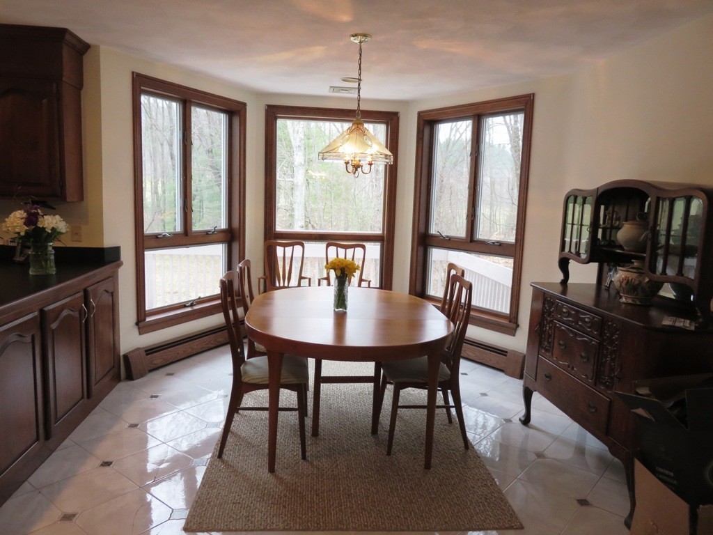 764 Main Street Boxford, MA 01921 - Photo 9 of 28 a view of a dining room with furniture window and outside view