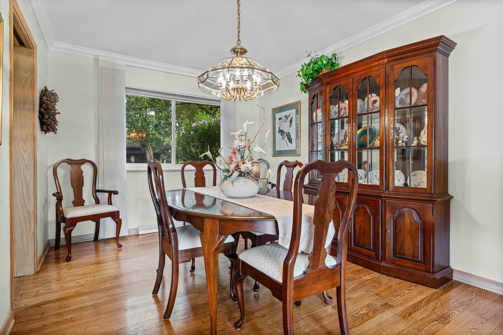 601 North Broadway Avenue Park Ridge, IL 60068 - Photo 7 of 24 a view of a dining room with furniture window and wooden floor