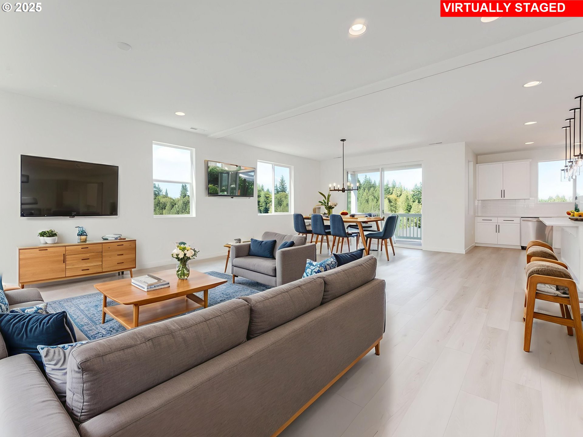 2151 Northeast Ridge Run Lane Estacada, OR 97023 - Photo 11 of 46 a living room with furniture and a flat screen tv