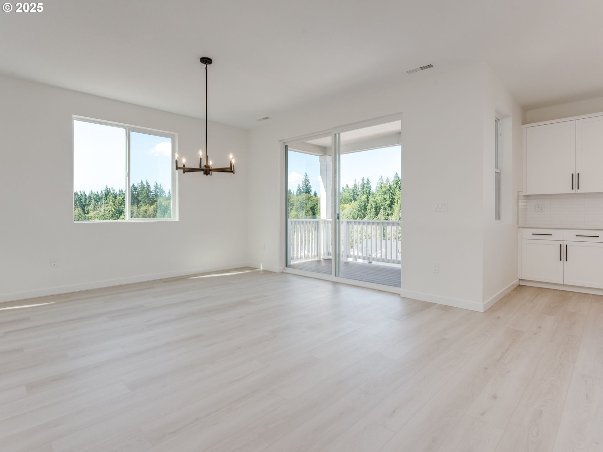 2151 Northeast Ridge Run Lane Estacada, OR 97023 - Photo 14 of 46 a view of an empty room with a window