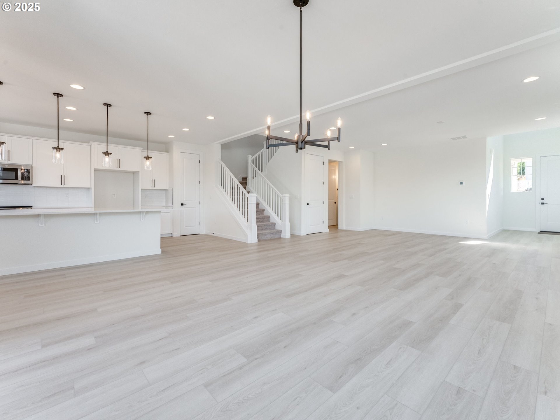2151 Northeast Ridge Run Lane Estacada, OR 97023 - Photo 16 of 46 a view of a kitchen with a dishwasher and white cabinets