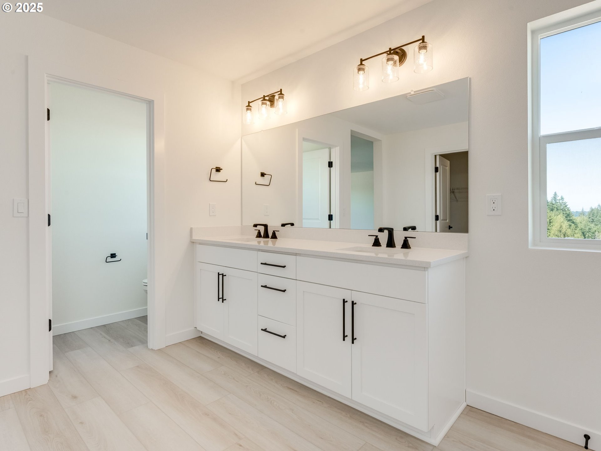 2151 Northeast Ridge Run Lane Estacada, OR 97023 - Photo 29 of 46 a bathroom with a double vanity sink mirror and