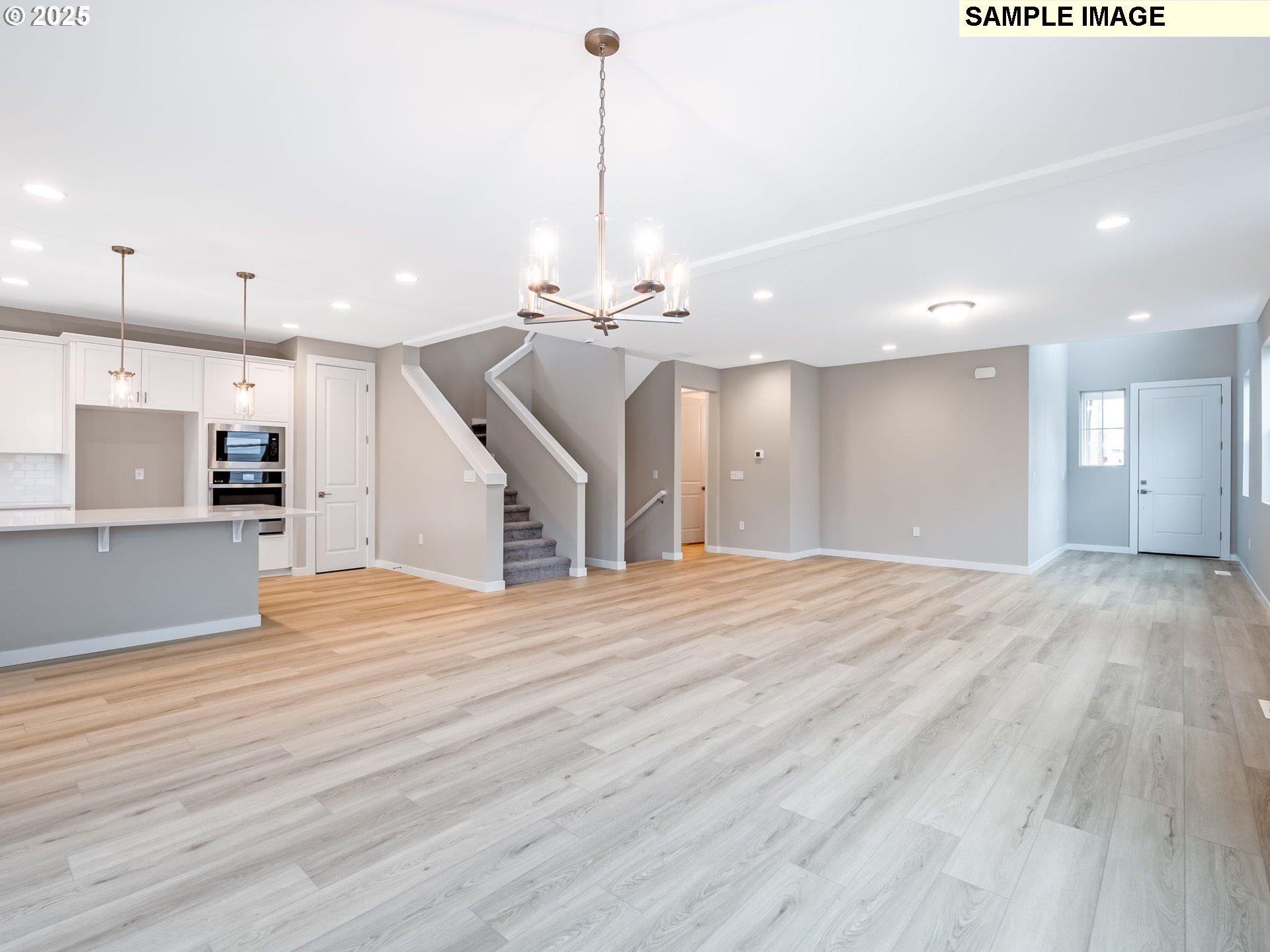 2151 Northeast Ridge Run Lane Estacada, OR 97023 - Photo 3 of 46 a view of a kitchen with a sink and a floor to ceiling window