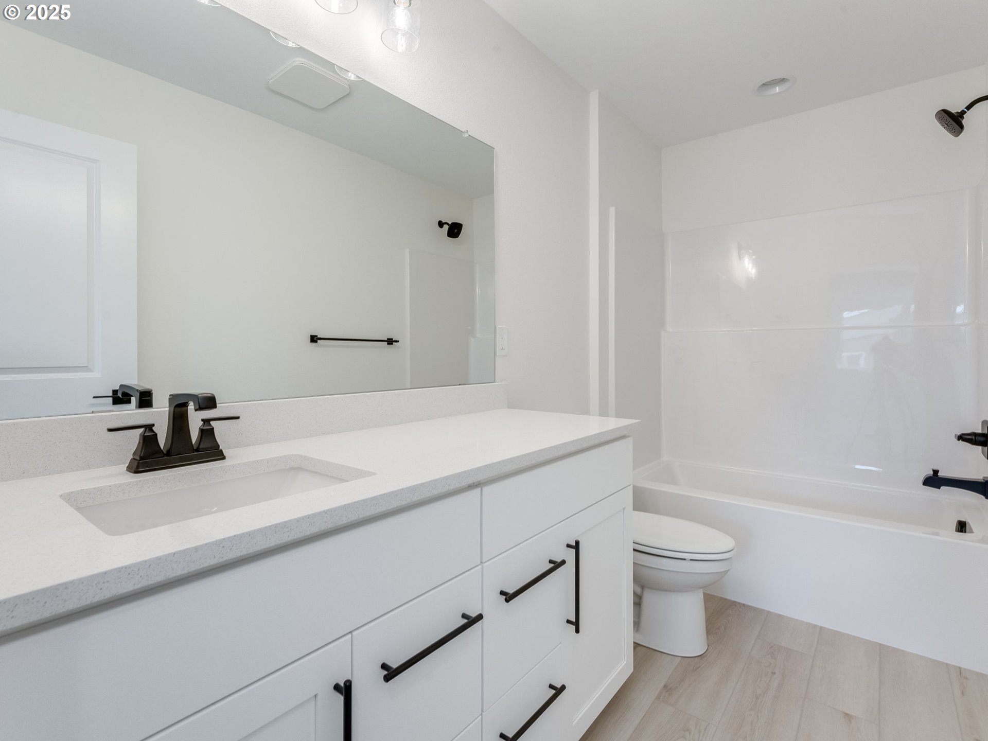 2151 Northeast Ridge Run Lane Estacada, OR 97023 - Photo 31 of 46 a bathroom with a sink a toilet and bathtub