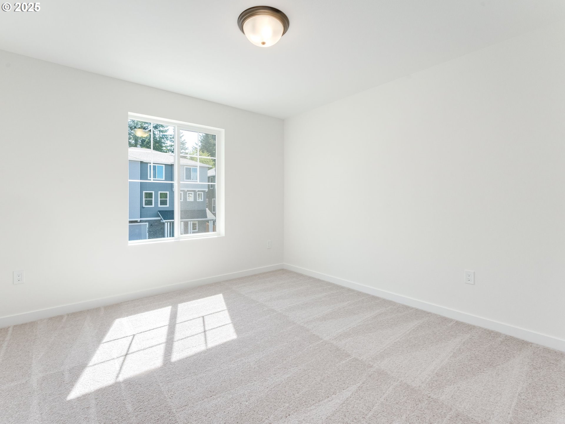 2151 Northeast Ridge Run Lane Estacada, OR 97023 - Photo 32 of 46 an empty room with a window