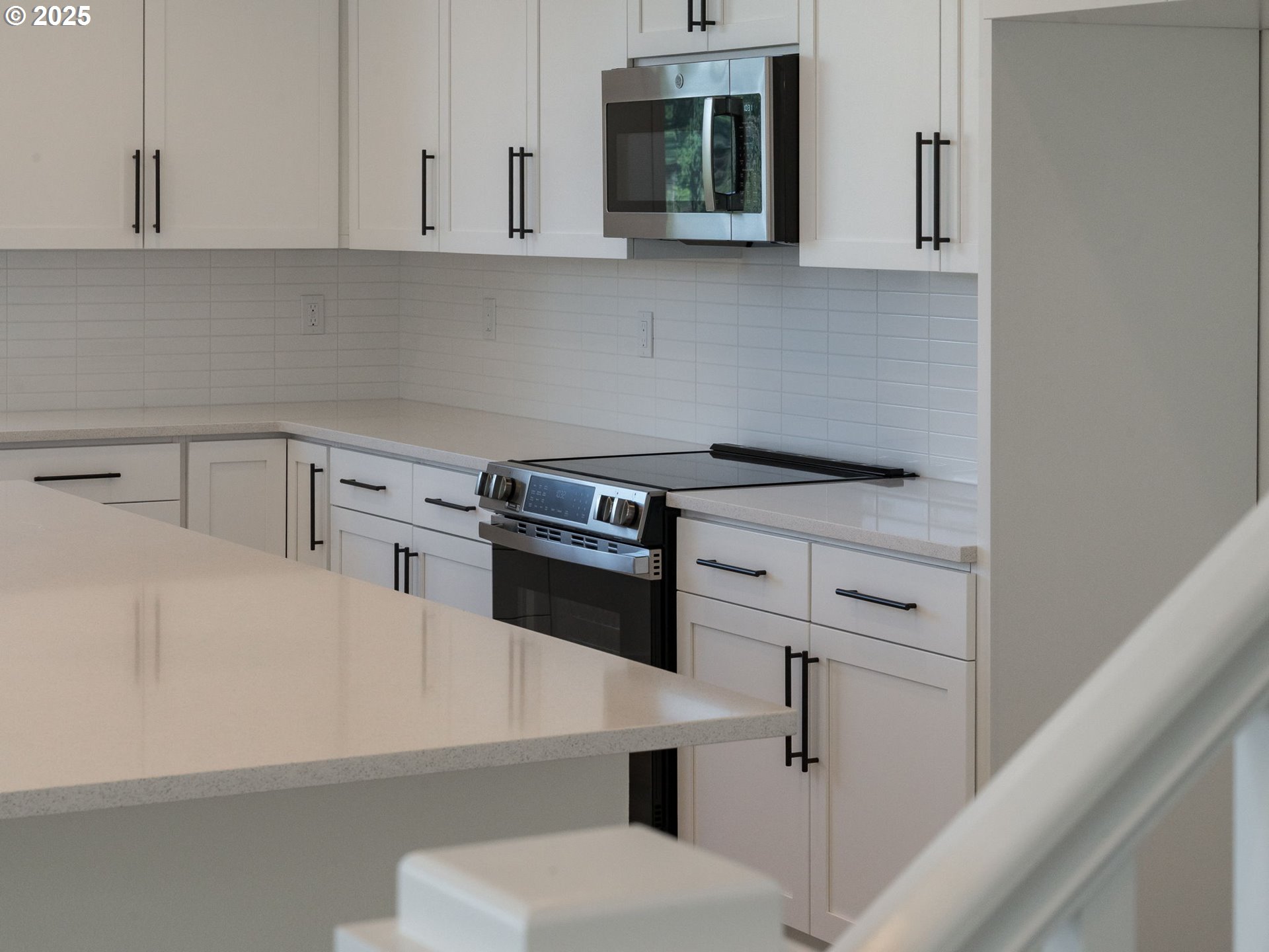 2151 Northeast Ridge Run Lane Estacada, OR 97023 - Photo 36 of 46 a kitchen with white cabinets and white appliances