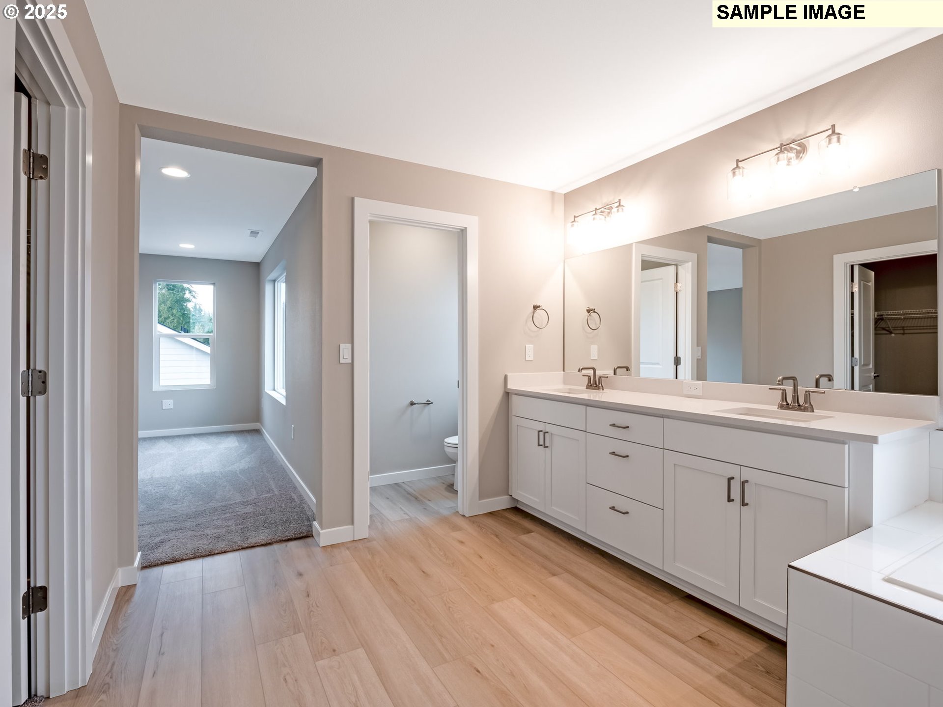2151 Northeast Ridge Run Lane Estacada, OR 97023 - Photo 9 of 46 a spacious bathroom with a double vanity sink and a mirror