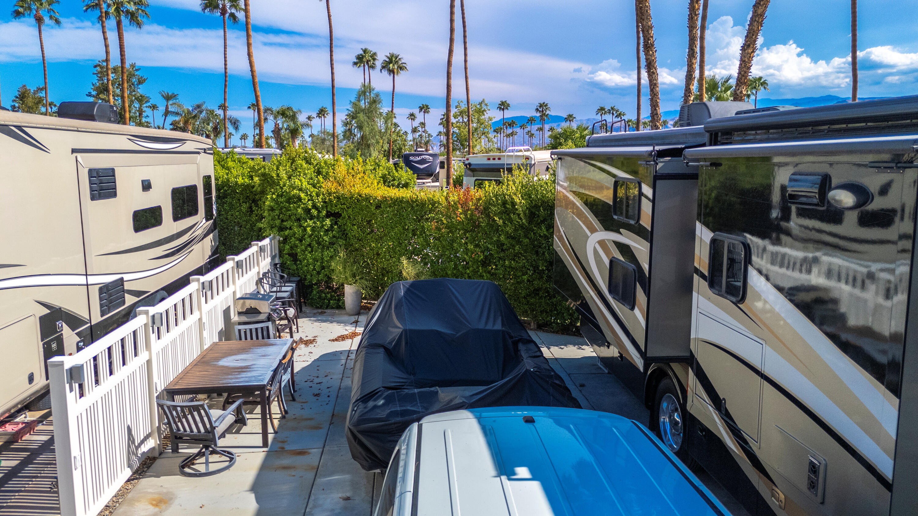 69411 Ramon Road, Unit 69 Cathedral City, CA 92234 - Photo 5 of 48 a view of a chairs and table in the balcony