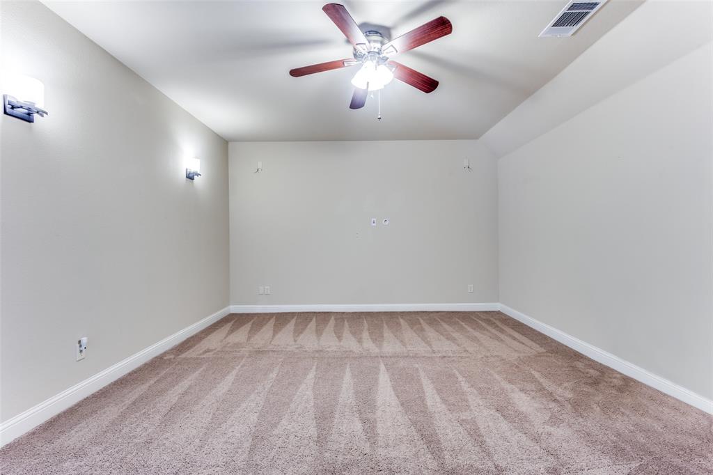 817 Deer Ridge Trail McKinney, TX 75072 - Photo 23 of 35 Media room with surround sound and celing fan