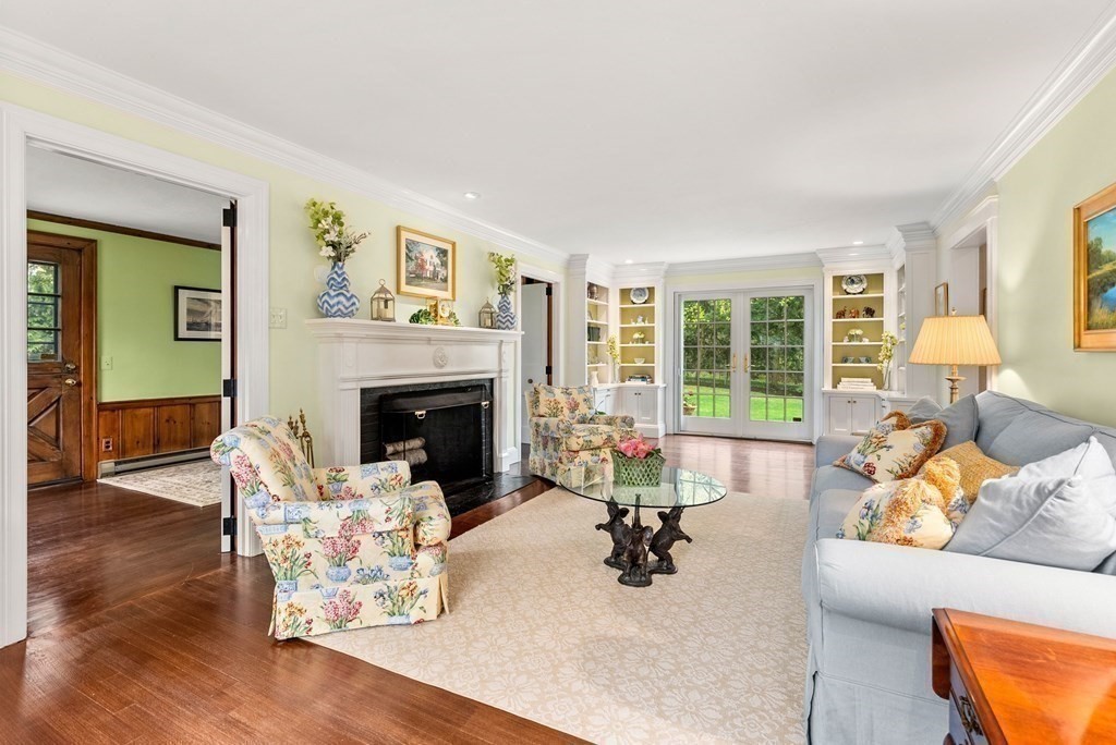 3 Viles Street Weston, MA 02493 - Photo 6 of 25 a living room with furniture and a fireplace