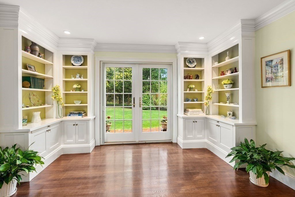 3 Viles Street Weston, MA 02493 - Photo 7 of 25 a view of an empty room with a window and wooden floor
