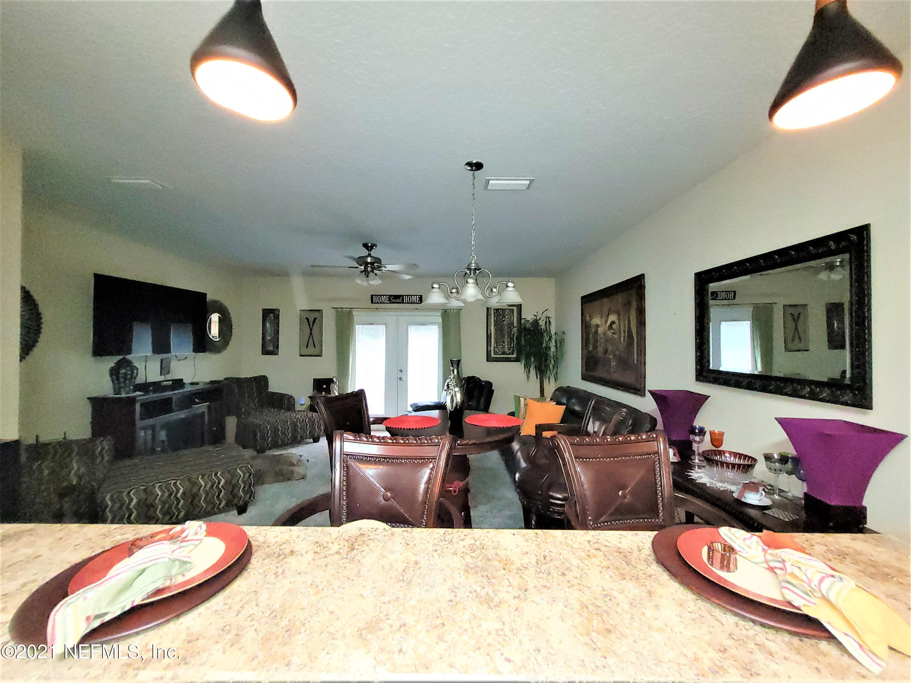 2190 Monument Road, Unit 104 Jacksonville, FL 32225 - Photo 10 of 27 View from Kitchen to Living Area