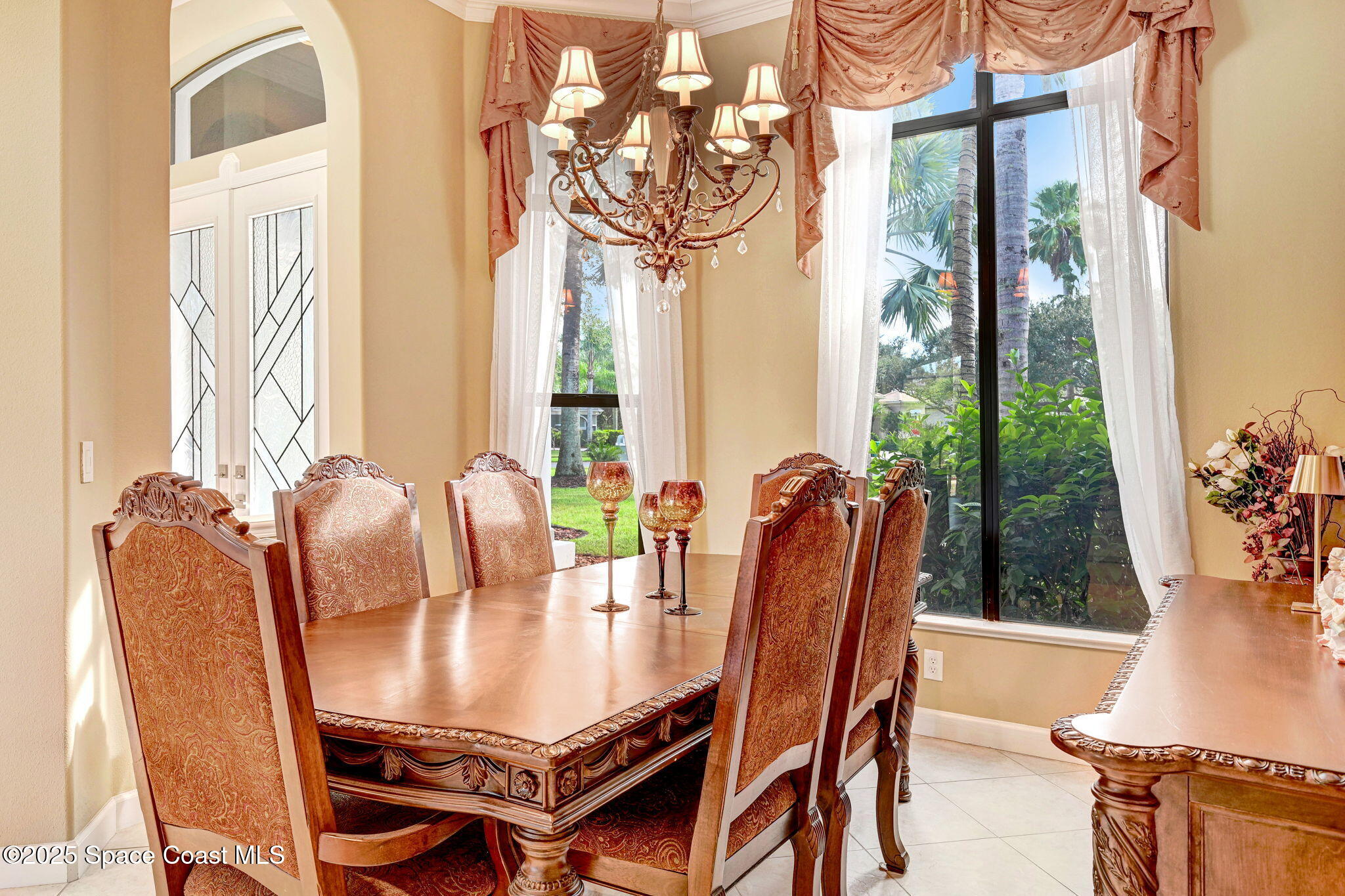 1418 Southpointe Court Melbourne, FL 32940 - Photo 15 of 52 a view of a dining room with furniture window and outside view