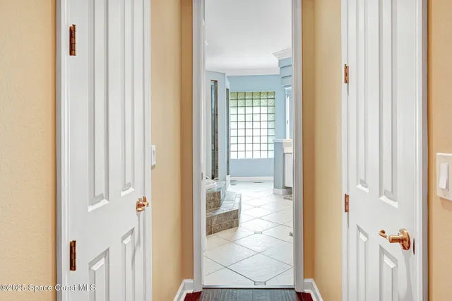 a bath room with a bath tub and shower