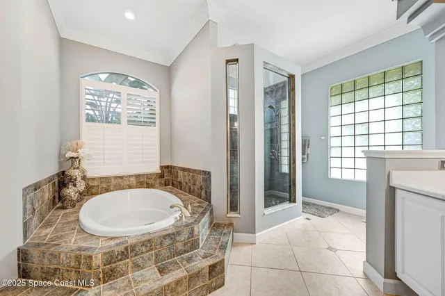 a view of a dining room with furniture and window