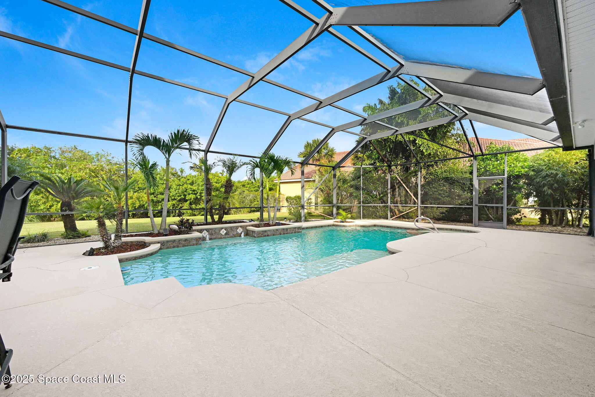 1418 Southpointe Court Melbourne, FL 32940 - Photo 39 of 52 a view of a swimming pool with a patio