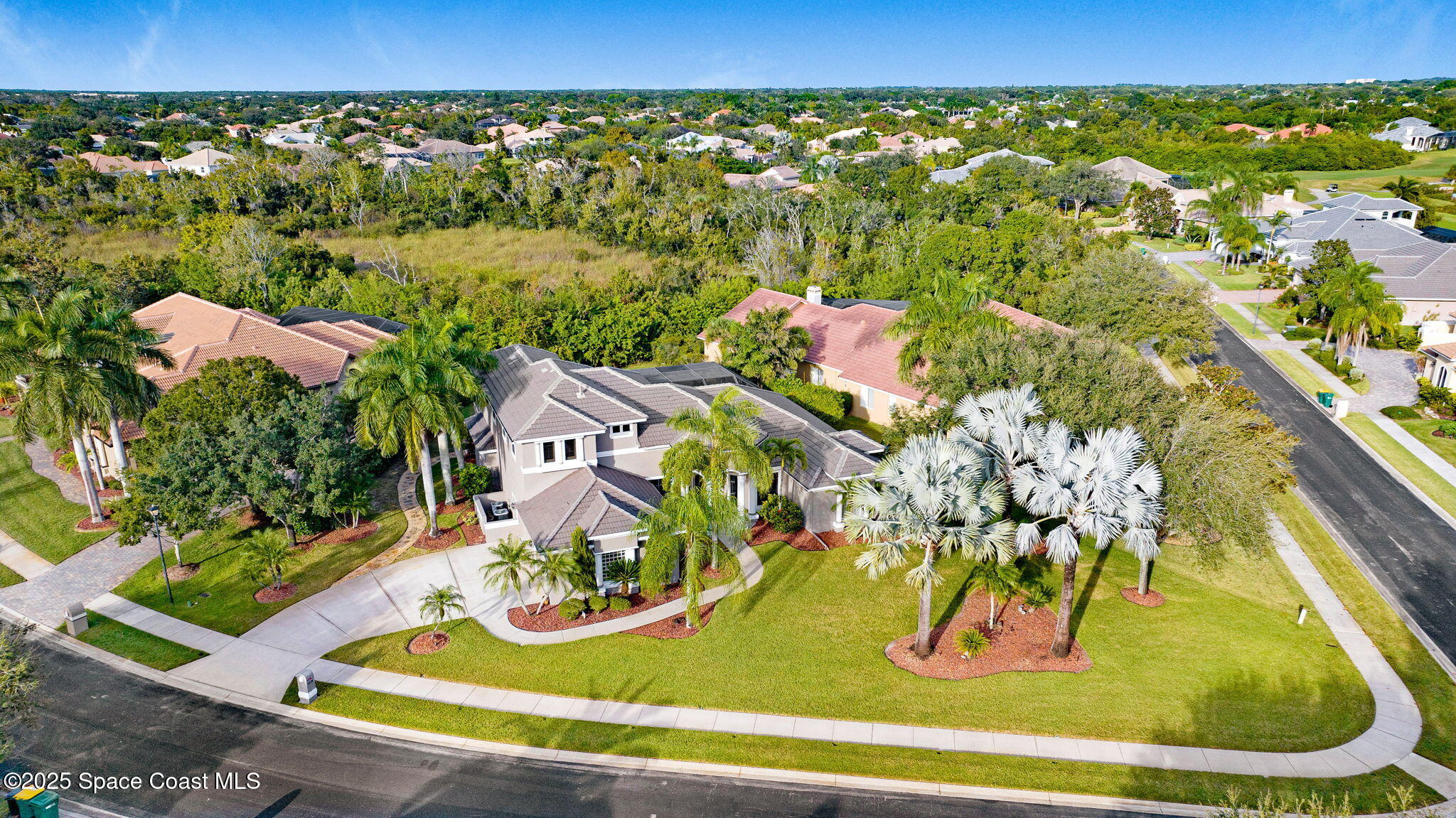 1418 Southpointe Court Melbourne, FL 32940 - Photo 4 of 52 DJI_20251111162858_0022_D