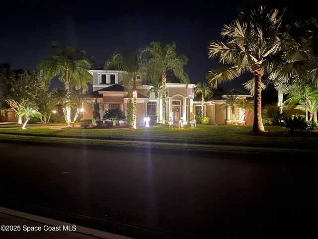 a front view of a building with lake view
