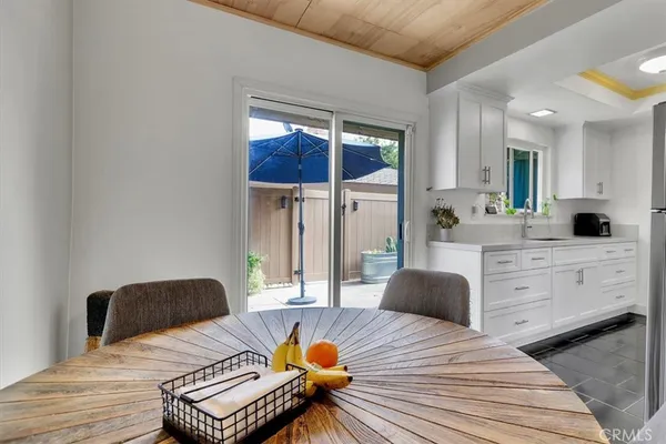 a kitchen with stainless steel appliances a sink and cabinets